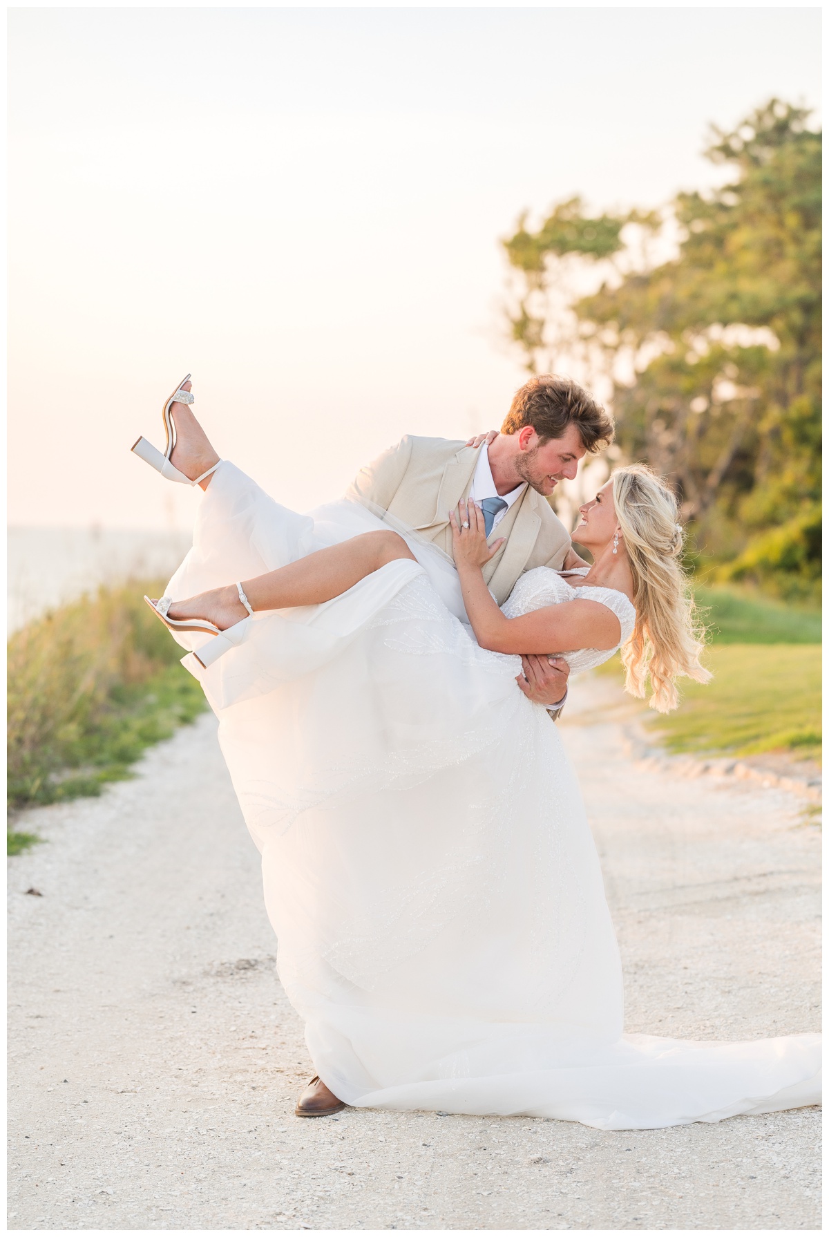 Eastern Short LDS First Look groom dipping bride while holding her